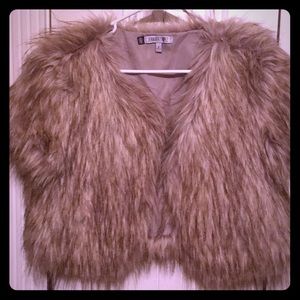 Jennifer Lopez faux fur vest